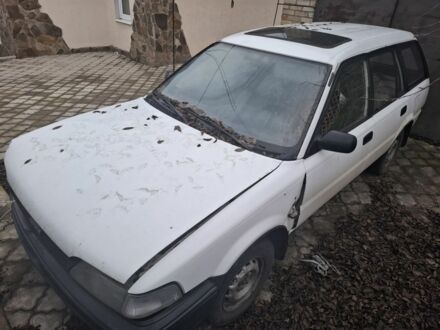 Белый Тойота Королла, объемом двигателя 0 л и пробегом 200 тыс. км за 593 $, фото 1 на Automoto.ua