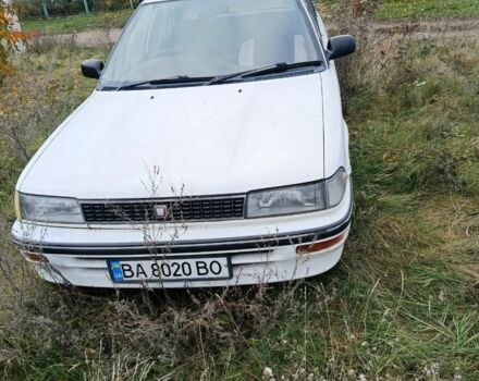 Белый Тойота Королла, объемом двигателя 1.8 л и пробегом 200 тыс. км за 700 $, фото 1 на Automoto.ua