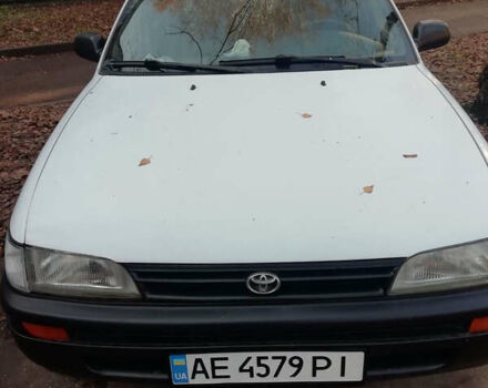 Белый Тойота Королла, объемом двигателя 1.3 л и пробегом 400 тыс. км за 2000 $, фото 1 на Automoto.ua