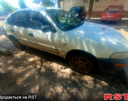 Белый Тойота Королла, объемом двигателя 1.3 л и пробегом 462 тыс. км за 1560 $, фото 1 на Automoto.ua