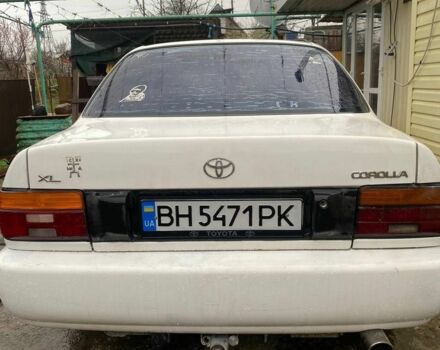 Белый Тойота Королла, объемом двигателя 1.3 л и пробегом 400 тыс. км за 1300 $, фото 1 на Automoto.ua