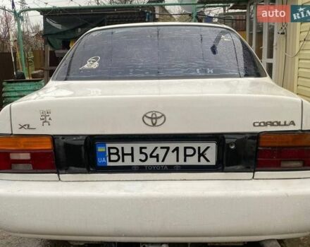 Белый Тойота Королла, объемом двигателя 1.3 л и пробегом 400 тыс. км за 1300 $, фото 1 на Automoto.ua