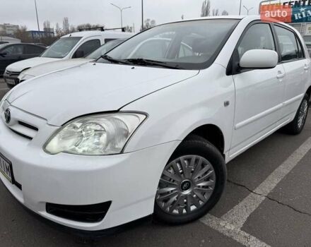 Белый Тойота Королла, объемом двигателя 1.4 л и пробегом 169 тыс. км за 5000 $, фото 1 на Automoto.ua
