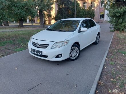 Білий Тойота Королла, об'ємом двигуна 1.6 л та пробігом 215 тис. км за 6900 $, фото 1 на Automoto.ua
