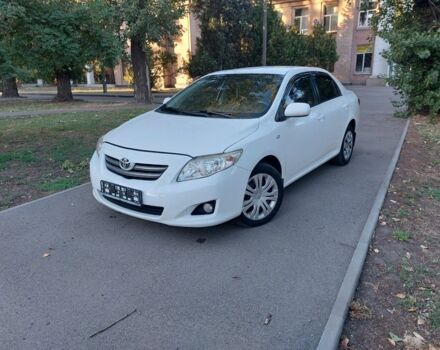 Білий Тойота Королла, об'ємом двигуна 1.6 л та пробігом 215 тис. км за 6900 $, фото 1 на Automoto.ua