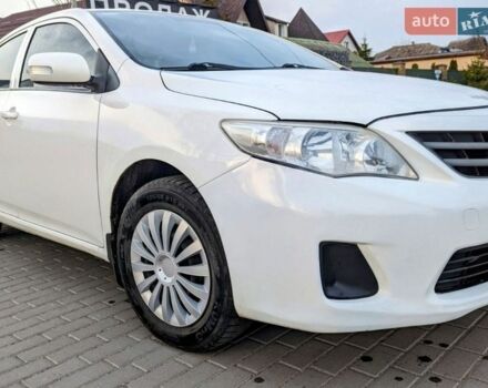 Белый Тойота Королла, объемом двигателя 1.3 л и пробегом 265 тыс. км за 6300 $, фото 1 на Automoto.ua