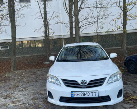 Белый Тойота Королла, объемом двигателя 1.33 л и пробегом 143 тыс. км за 7000 $, фото 1 на Automoto.ua