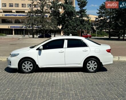 Белый Тойота Королла, объемом двигателя 1.33 л и пробегом 148 тыс. км за 7000 $, фото 1 на Automoto.ua