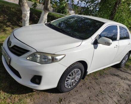 Білий Тойота Королла, об'ємом двигуна 1.3 л та пробігом 325 тис. км за 6600 $, фото 1 на Automoto.ua