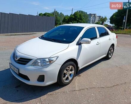 Білий Тойота Королла, об'ємом двигуна 1.33 л та пробігом 230 тис. км за 6200 $, фото 1 на Automoto.ua