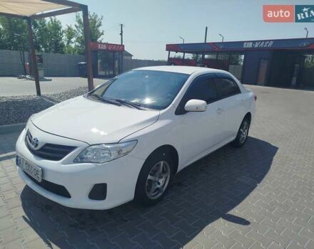 Белый Тойота Королла, объемом двигателя 1.33 л и пробегом 300 тыс. км за 7950 $, фото 1 на Automoto.ua