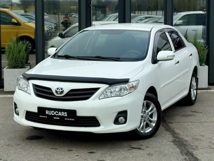 Білий Тойота Королла, об'ємом двигуна 1.33 л та пробігом 243 тис. км за 7199 $, фото 1 на Automoto.ua