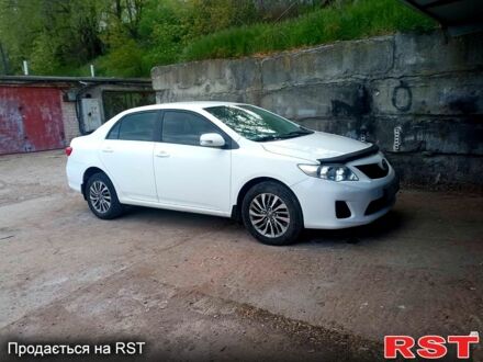 Білий Тойота Королла, об'ємом двигуна 1.6 л та пробігом 165 тис. км за 9500 $, фото 1 на Automoto.ua