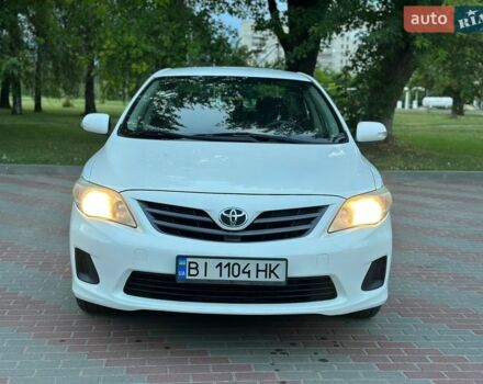 Белый Тойота Королла, объемом двигателя 1.33 л и пробегом 203 тыс. км за 7000 $, фото 1 на Automoto.ua