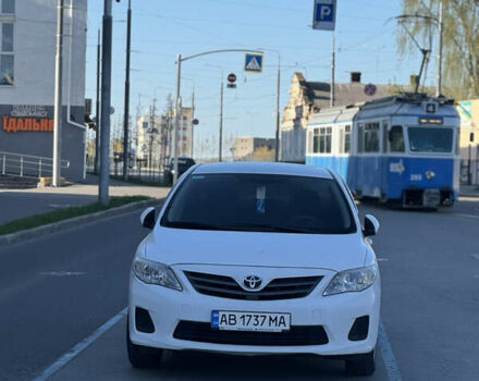 Белый Тойота Королла, объемом двигателя 1.33 л и пробегом 183 тыс. км за 8000 $, фото 1 на Automoto.ua