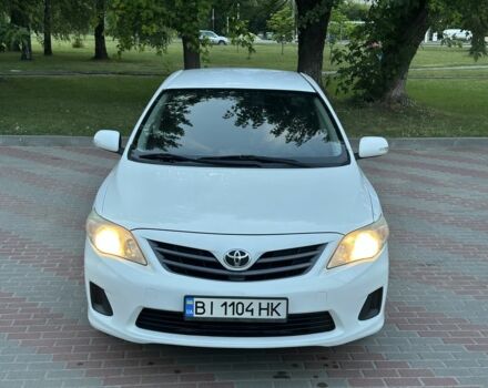 Білий Тойота Королла, об'ємом двигуна 1.3 л та пробігом 202 тис. км за 7400 $, фото 1 на Automoto.ua