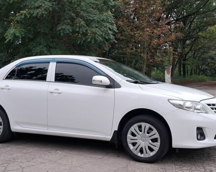 Белый Тойота Королла, объемом двигателя 1.6 л и пробегом 108 тыс. км за 8900 $, фото 1 на Automoto.ua