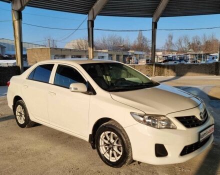 Белый Тойота Королла, объемом двигателя 0 л и пробегом 128 тыс. км за 7999 $, фото 1 на Automoto.ua