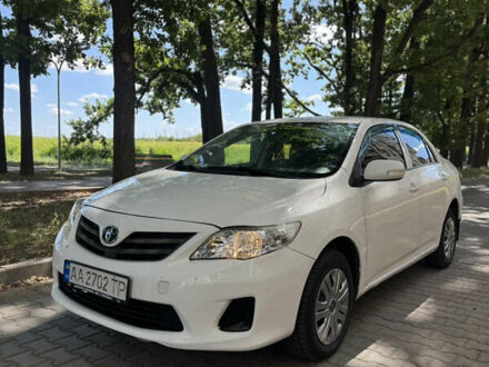 Білий Тойота Королла, об'ємом двигуна 1.33 л та пробігом 123 тис. км за 4950 $, фото 1 на Automoto.ua