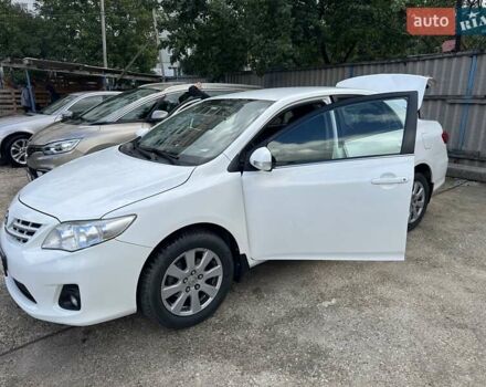 Білий Тойота Королла, об'ємом двигуна 1.6 л та пробігом 142 тис. км за 9300 $, фото 1 на Automoto.ua