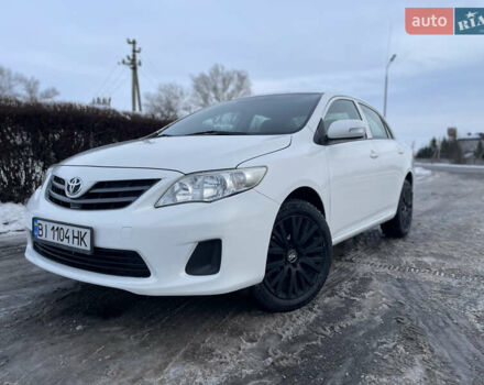 Белый Тойота Королла, объемом двигателя 1.33 л и пробегом 197 тыс. км за 4999 $, фото 1 на Automoto.ua