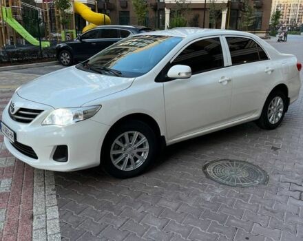 Білий Тойота Королла, об'ємом двигуна 1.3 л та пробігом 105 тис. км за 8400 $, фото 1 на Automoto.ua