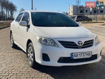 Білий Тойота Королла, об'ємом двигуна 1.3 л та пробігом 183 тис. км за 5850 $, фото 1 на Automoto.ua