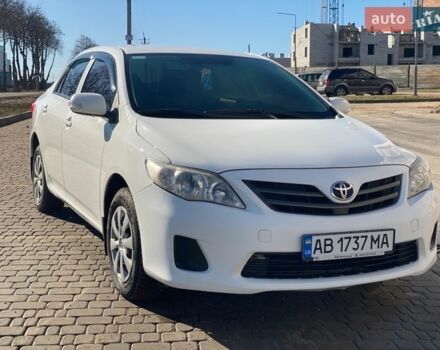 Белый Тойота Королла, объемом двигателя 1.3 л и пробегом 183 тыс. км за 5850 $, фото 1 на Automoto.ua