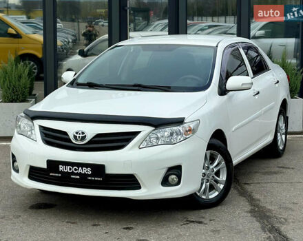 Белый Тойота Королла, объемом двигателя 1.33 л и пробегом 243 тыс. км за 6999 $, фото 1 на Automoto.ua