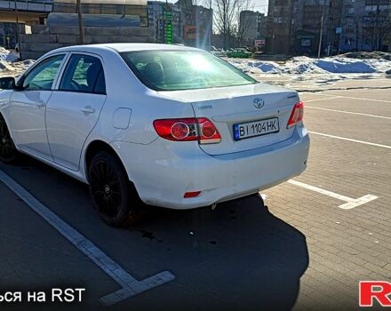 Белый Тойота Королла, объемом двигателя 1.3 л и пробегом 198 тыс. км за 6950 $, фото 1 на Automoto.ua