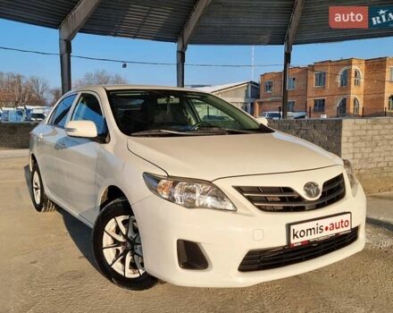 Белый Тойота Королла, объемом двигателя 1.3 л и пробегом 128 тыс. км за 7999 $, фото 1 на Automoto.ua