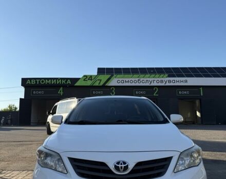 Белый Тойота Королла, объемом двигателя 1.3 л и пробегом 186 тыс. км за 7300 $, фото 1 на Automoto.ua