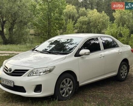 Білий Тойота Королла, об'ємом двигуна 1.3 л та пробігом 153 тис. км за 7999 $, фото 1 на Automoto.ua
