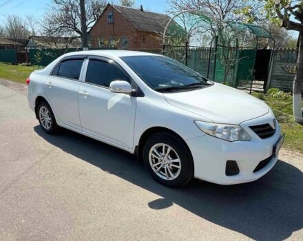 Белый Тойота Королла, объемом двигателя 1.3 л и пробегом 150 тыс. км за 6300 $, фото 1 на Automoto.ua