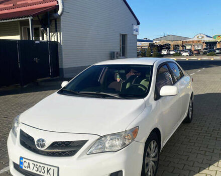 Белый Тойота Королла, объемом двигателя 1.8 л и пробегом 220 тыс. км за 7999 $, фото 1 на Automoto.ua