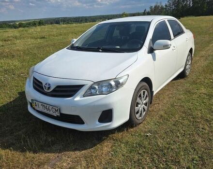 Белый Тойота Королла, объемом двигателя 1.33 л и пробегом 303 тыс. км за 6500 $, фото 1 на Automoto.ua