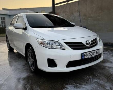 Білий Тойота Королла, об'ємом двигуна 1.33 л та пробігом 173 тис. км за 8100 $, фото 1 на Automoto.ua