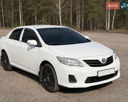 Белый Тойота Королла, объемом двигателя 1.33 л и пробегом 227 тыс. км за 7500 $, фото 1 на Automoto.ua
