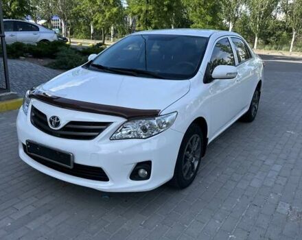 Білий Тойота Королла, об'ємом двигуна 1.3 л та пробігом 98 тис. км за 7999 $, фото 1 на Automoto.ua