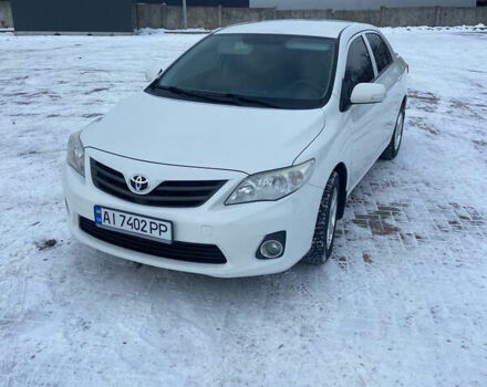 Білий Тойота Королла, об'ємом двигуна 1.6 л та пробігом 178 тис. км за 9200 $, фото 1 на Automoto.ua