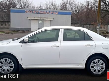 Білий Тойота Королла, об'ємом двигуна 1.6 л та пробігом 83 тис. км за 9300 $, фото 1 на Automoto.ua