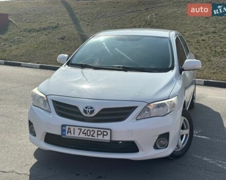Белый Тойота Королла, объемом двигателя 1.33 л и пробегом 180 тыс. км за 7500 $, фото 1 на Automoto.ua