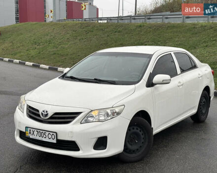 Белый Тойота Королла, объемом двигателя 1.33 л и пробегом 210 тыс. км за 7000 $, фото 1 на Automoto.ua