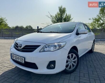 Білий Тойота Королла, об'ємом двигуна 1.33 л та пробігом 248 тис. км за 7700 $, фото 1 на Automoto.ua