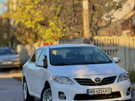 Белый Тойота Королла, объемом двигателя 1.33 л и пробегом 220 тыс. км за 6500 $, фото 1 на Automoto.ua