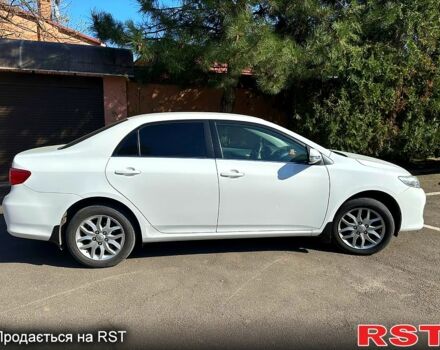 Білий Тойота Королла, об'ємом двигуна 1.6 л та пробігом 171 тис. км за 10300 $, фото 1 на Automoto.ua