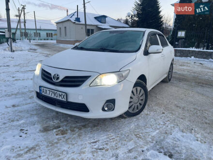 Білий Тойота Королла, об'ємом двигуна 1.33 л та пробігом 205 тис. км за 6900 $, фото 1 на Automoto.ua