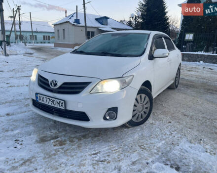 Белый Тойота Королла, объемом двигателя 1.33 л и пробегом 205 тыс. км за 6900 $, фото 1 на Automoto.ua