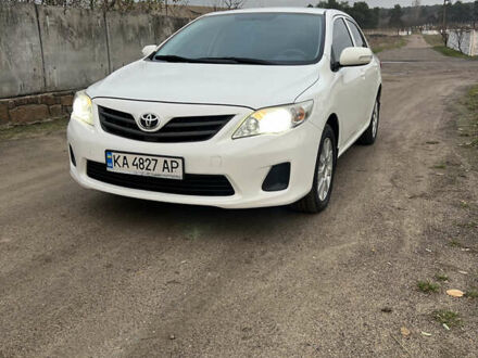 Белый Тойота Королла, объемом двигателя 1.3 л и пробегом 305 тыс. км за 8100 $, фото 1 на Automoto.ua