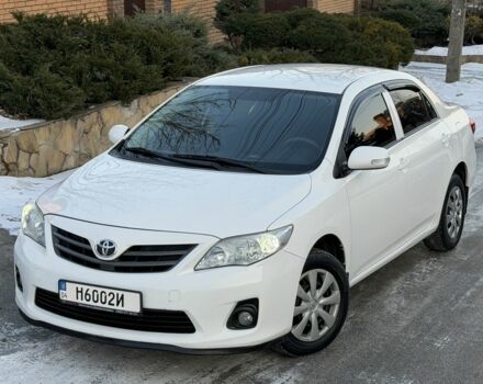 Белый Тойота Королла, объемом двигателя 1.3 л и пробегом 145 тыс. км за 6700 $, фото 1 на Automoto.ua